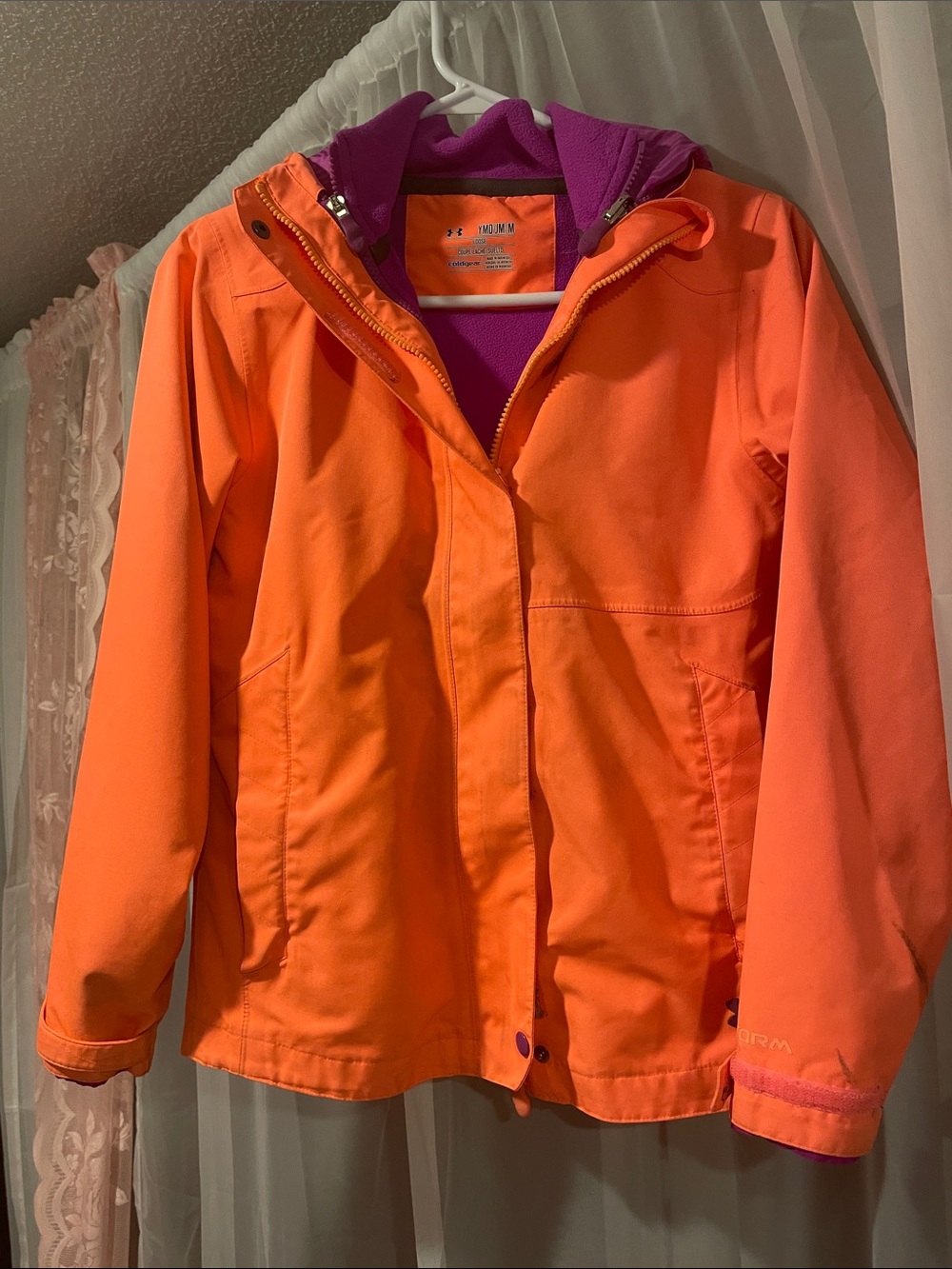 Under Armour Kids Orange jacket with Purple Fleece inside that zips out